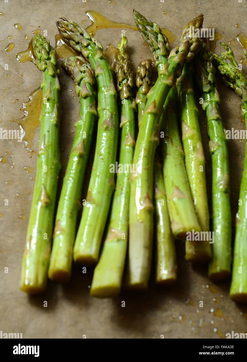 Oven roasted asparagus with olive oil in a pan Stock Photo Alamy