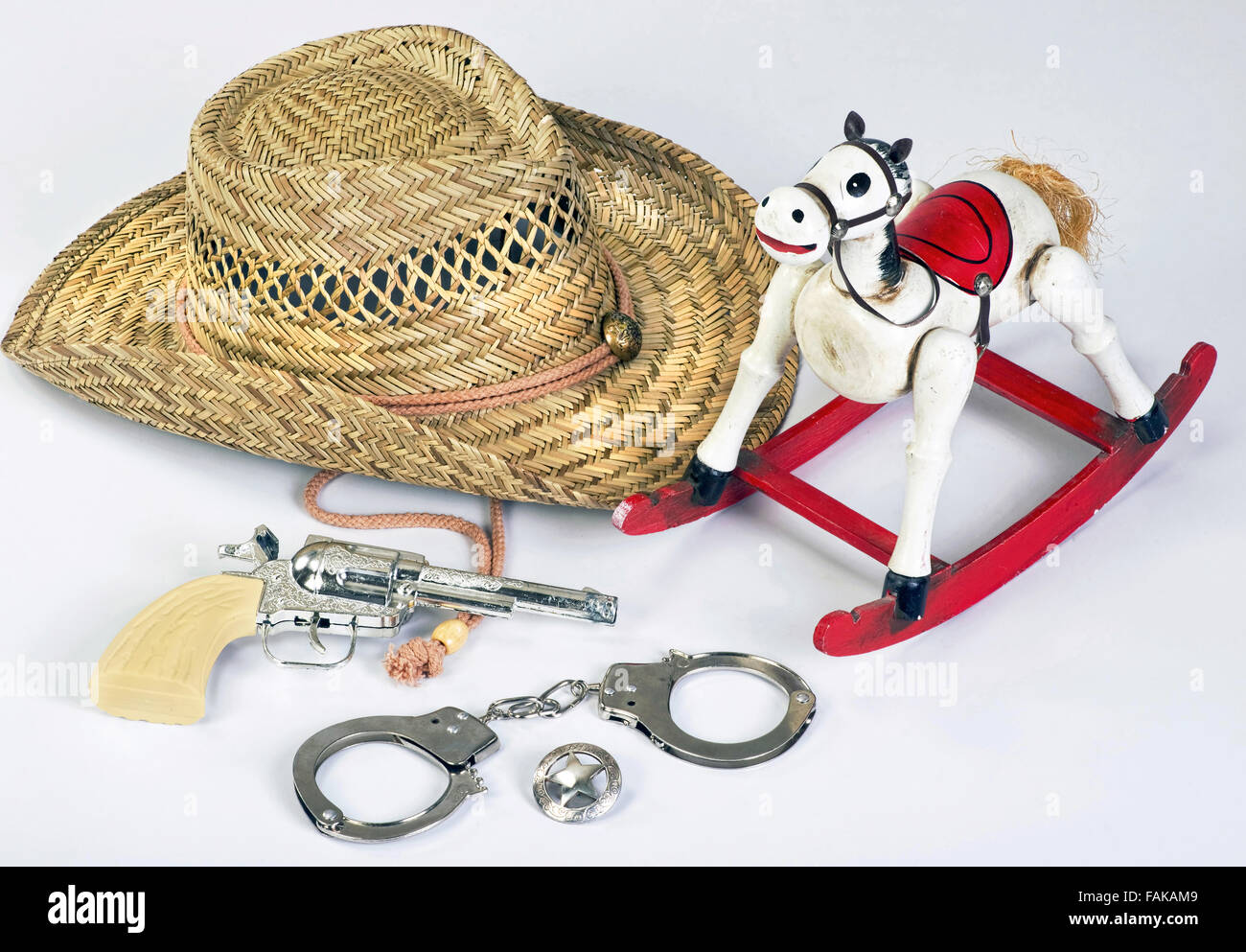 Old vintage childhood western cowboy toys. Stock Photo