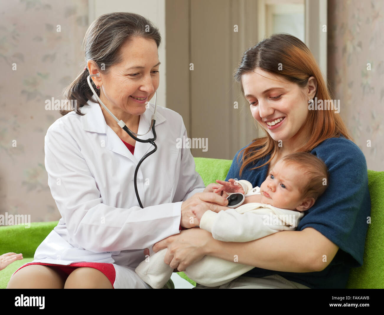 doctor-examining-newborn-baby-on-mother-s-arms-stock-photo-alamy