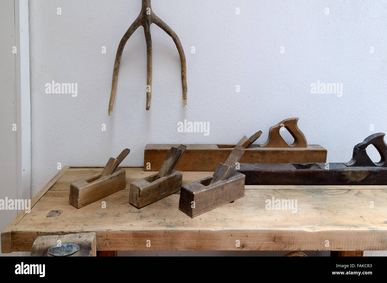 Vintage or Old Wood or Wooden Planes Saws & Bench Used for Carpentry or Woodwork Stock Photo