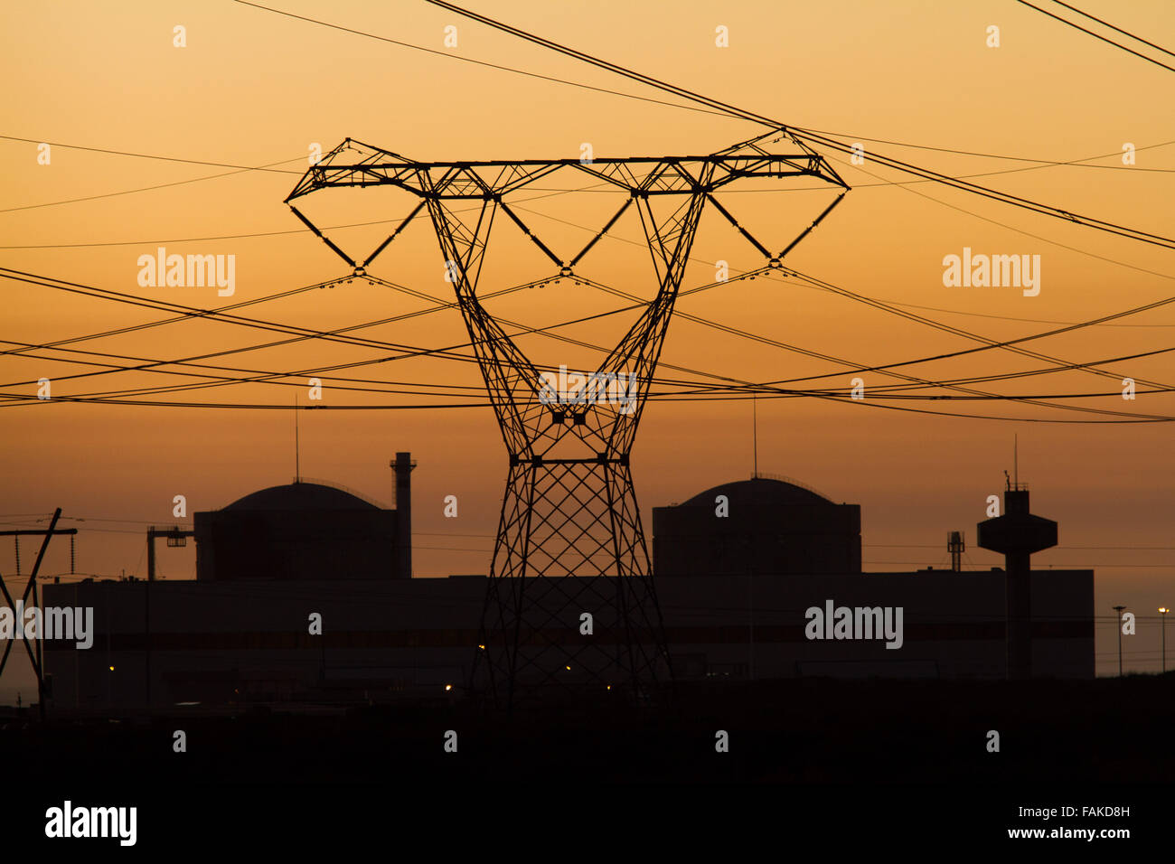 Koeberg nuclear power plant and pylon at sunset. Stock Photo