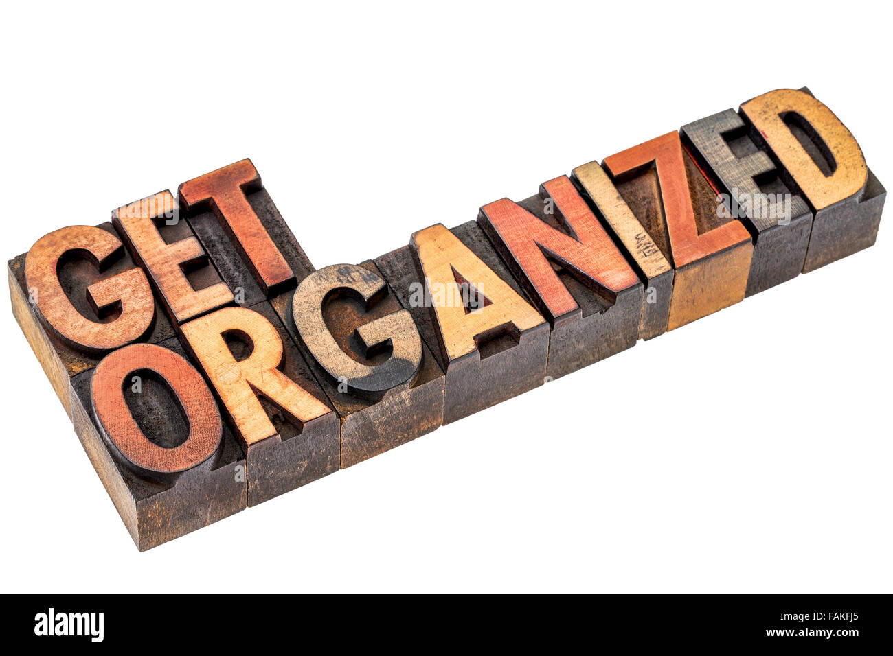 get organized  motivational phrase - isolated text in vintage letterpress wood type stained by color inks Stock Photo