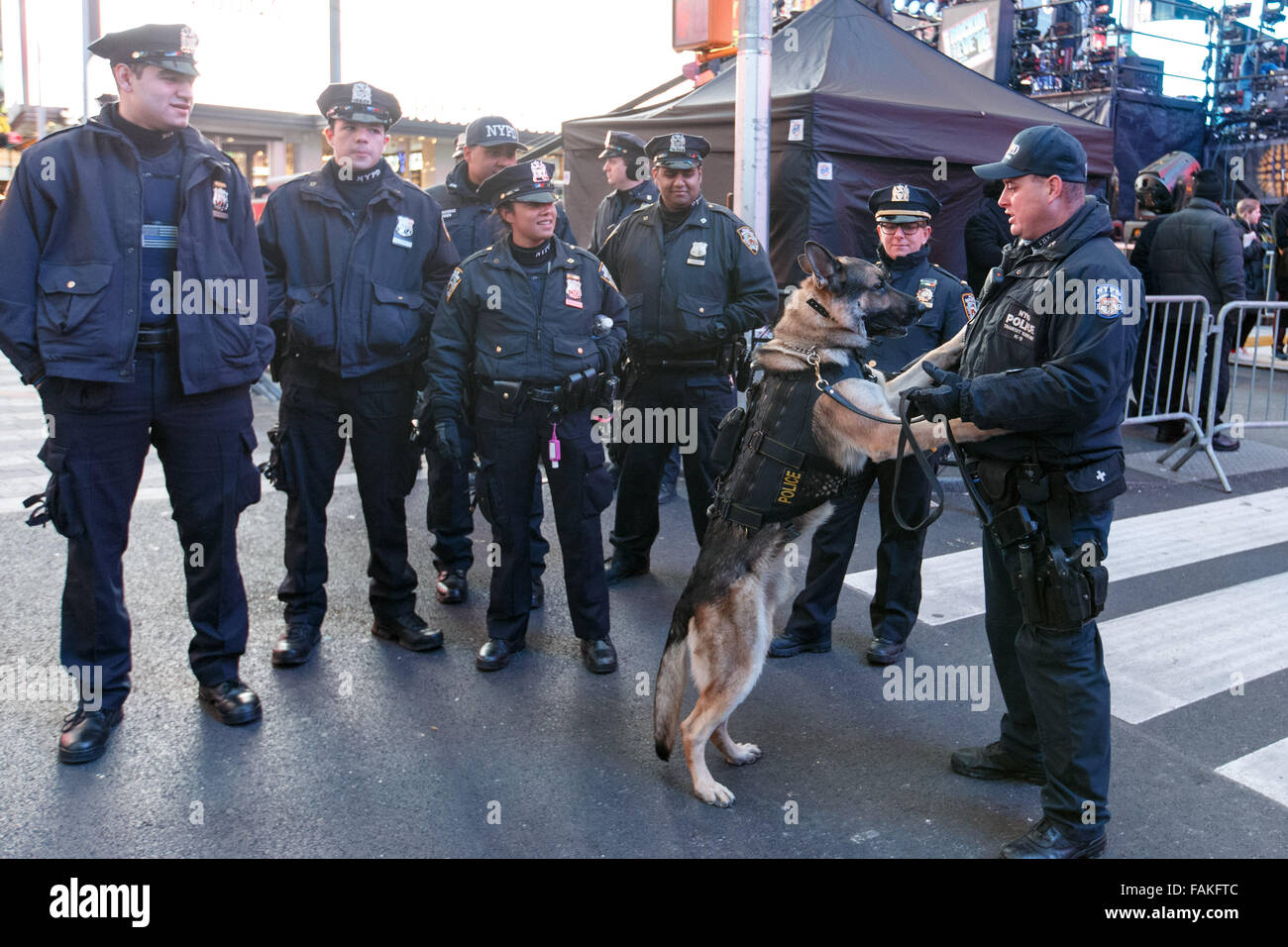 New York, USA. 31st Dec, 2015. Police officers stand guard at Times ...