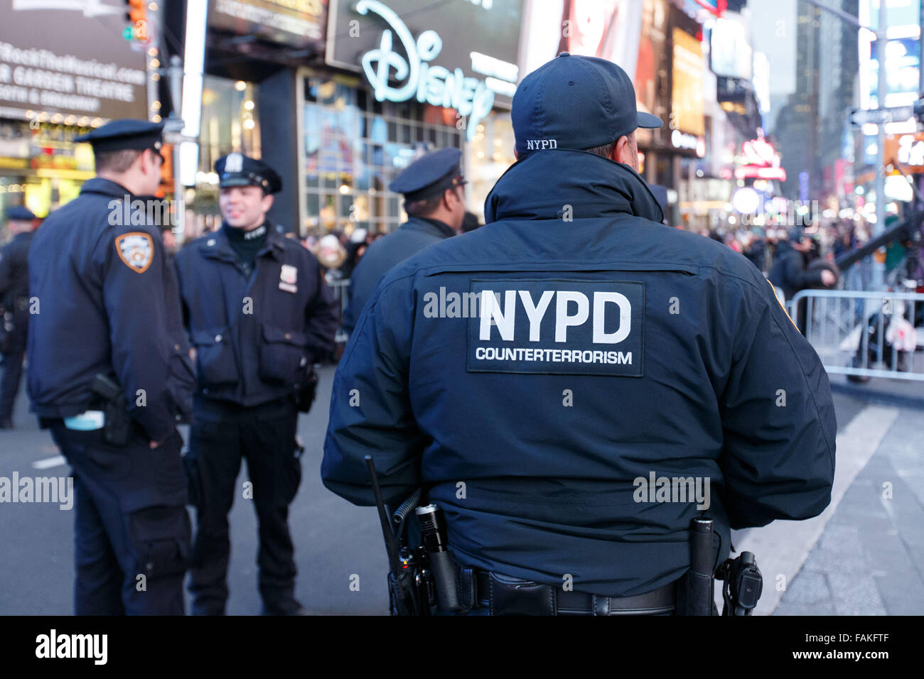 New York, USA. 31st Dec, 2015. Police officers stand guard at Times ...