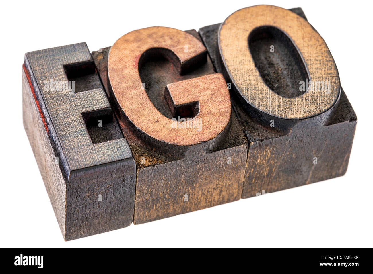 ego word in vintage wood letterpress printing blocks, stained by color inks, isolated on white - oversized ego concept Stock Photo