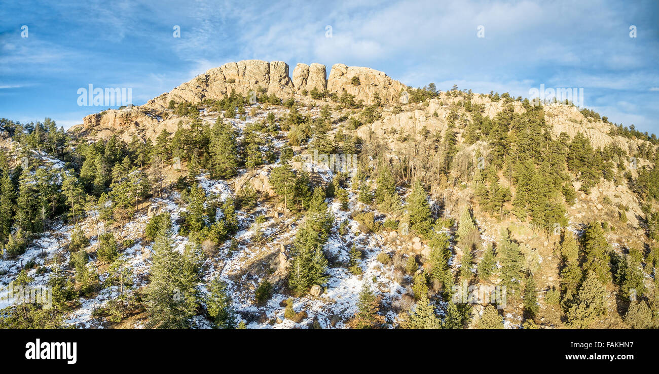 panoramic landscape of Horsetooth Rock, a landmark of Fort Collins, Colorado, winter scenery with some snow Stock Photo