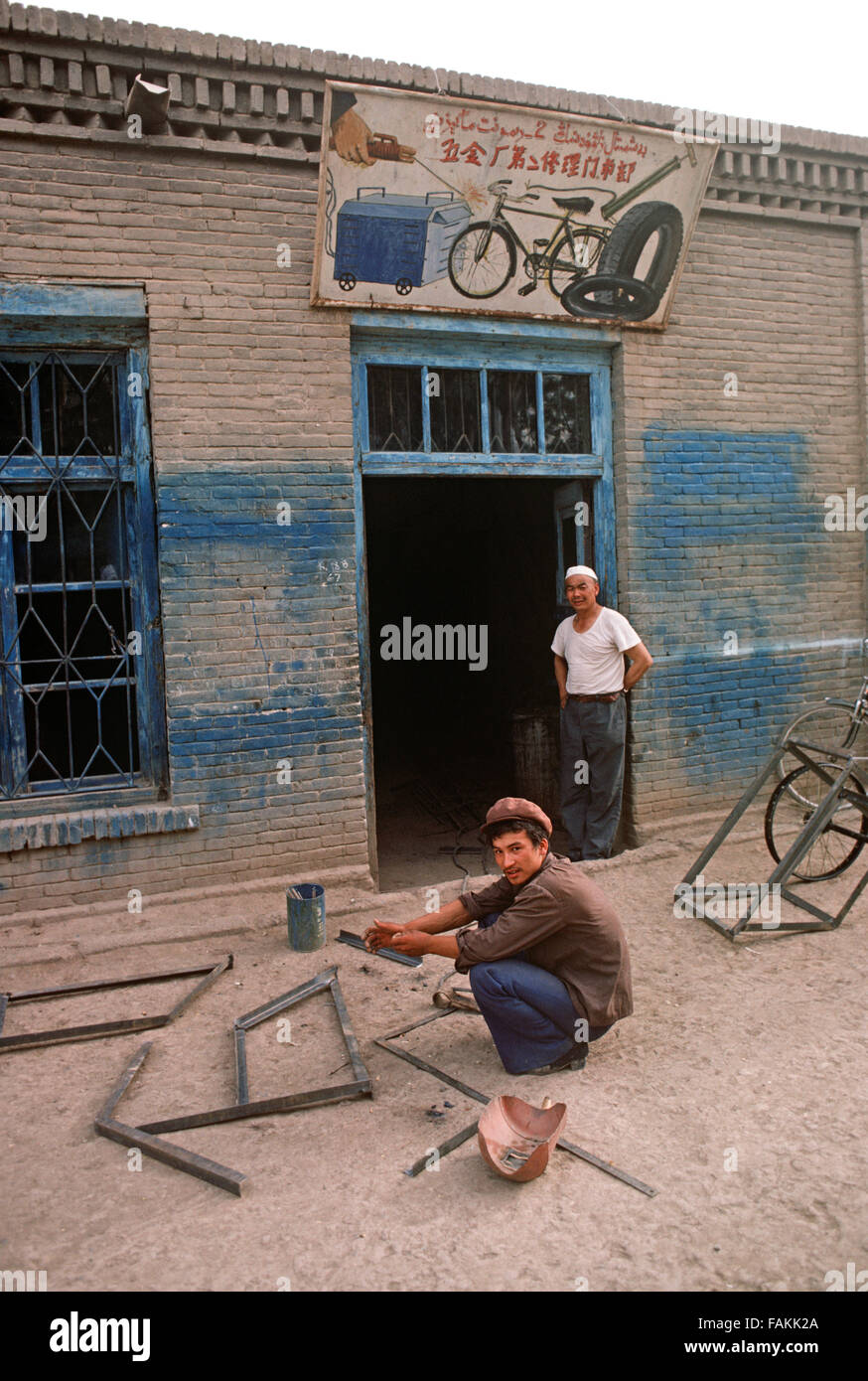 Metal workers, Turpan, Xinjiang Province, China Stock Photo