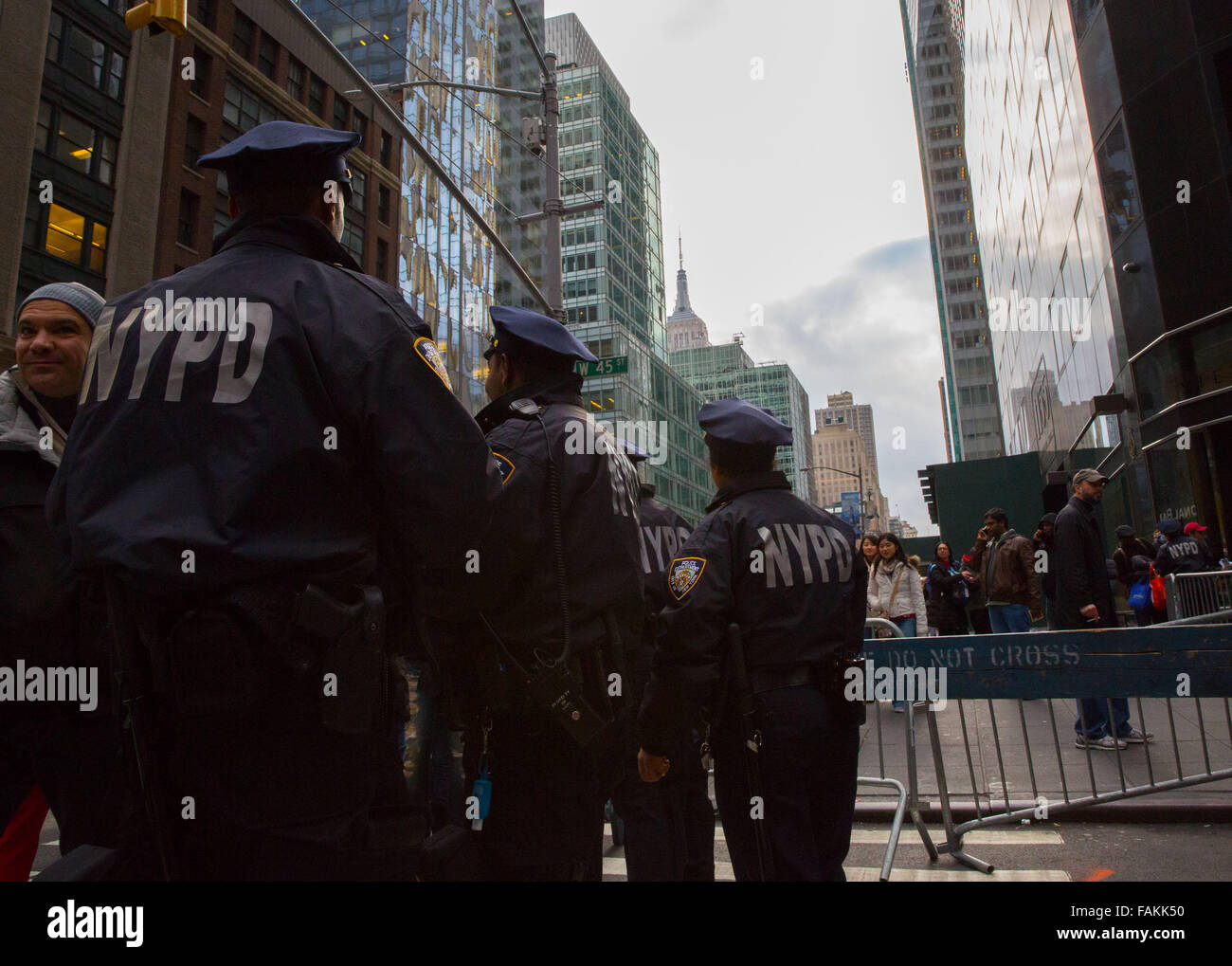 New York, NY, USA. 31st Dec, 2015. The NYPD deploy 6,000 officers in Times Square on New Years Eve, including more than 500 members of the NYPD's new anti terror force. This action is taken by the NYPD  in response to reported terror threats by ISIS on New York, Washington DC, and Los Angeles. NYPD Chief of Department James O'Neil stressed ' People should feel safe this New Year's Eve because we're there. ' Credit:  Scott Houston/Alamy Live News Stock Photo
