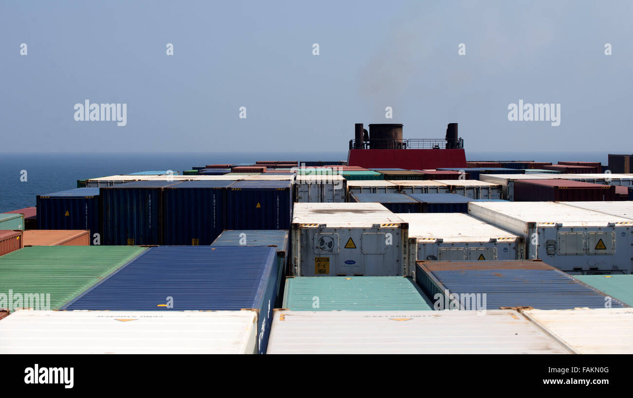 Outside smoke funnel on Container ship expels boiler steam as it sails through Somalia and Yemen to Southampton in the UK Stock Photo