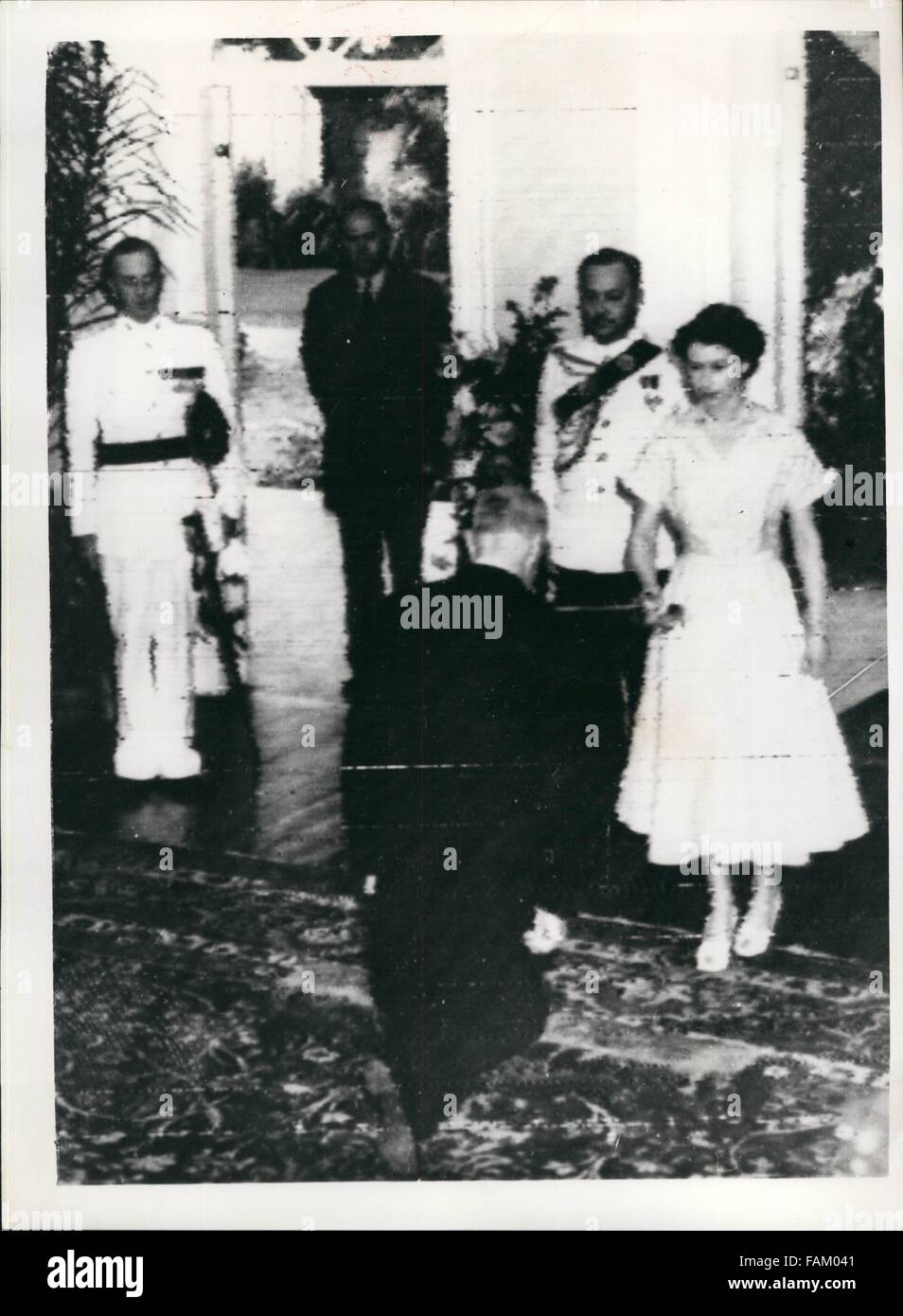 1952 - Queen Elizabeth 11, held an investiture at King's House, Kingston, Jamaica, today (November 27th.) at which one knight was dubbed and thirteen other proud Jamaicans received awards bestowed upon them, Mostly among the coronations honours. The first of the twelve men and two women to be invested was Mr. Kenneth Kennedy O' Connor, Q.C., M.C. Chief justice of Jamaica, who was made a knight bachelor in the 1952 birthday honours . Photo shows Queen Elizabeth 11 Hestowing the Accolade on Mr. Kenneth O'Connor, During the Investiture in the chapel of King's House (Credit Image: © Keystone Pictu Stock Photo