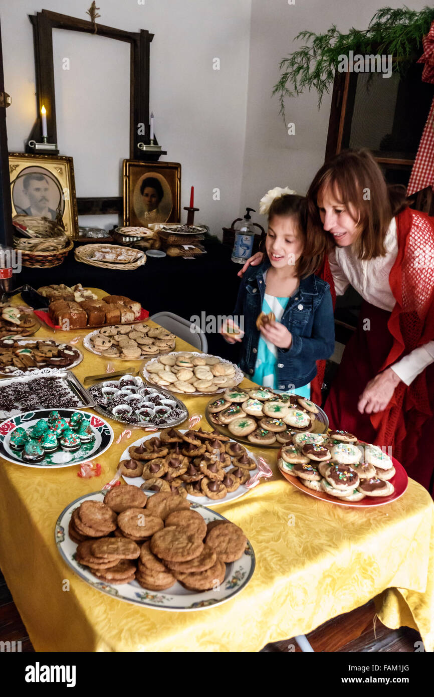 Gainesville Florida,Haile Homestead Plantation House,Candlelight Visits,Christmas cookies,variety,table,girl girls,youngster youngsters youth youths f Stock Photo