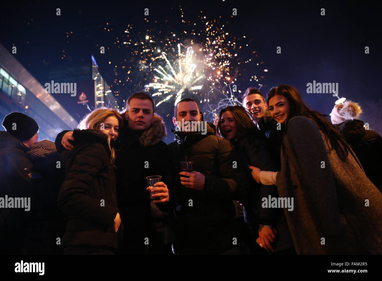 Sarajevo, Bosnia-Herzegovina. 31st Dec, 2015. People attend a concert to celebrate the New Year at the BBI Square in central Sarajevo, Bosnia-Herzegovina, Dec. 31, 2015. Sarajevo residents and tourists traditionally welcome the New Year on the streets of the city. Credit:  Haris Memija/Xinhua/Alamy Live News Stock Photo