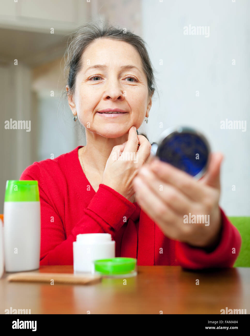 Mature woman mirror sad hi-res stock photography and images - Alamy