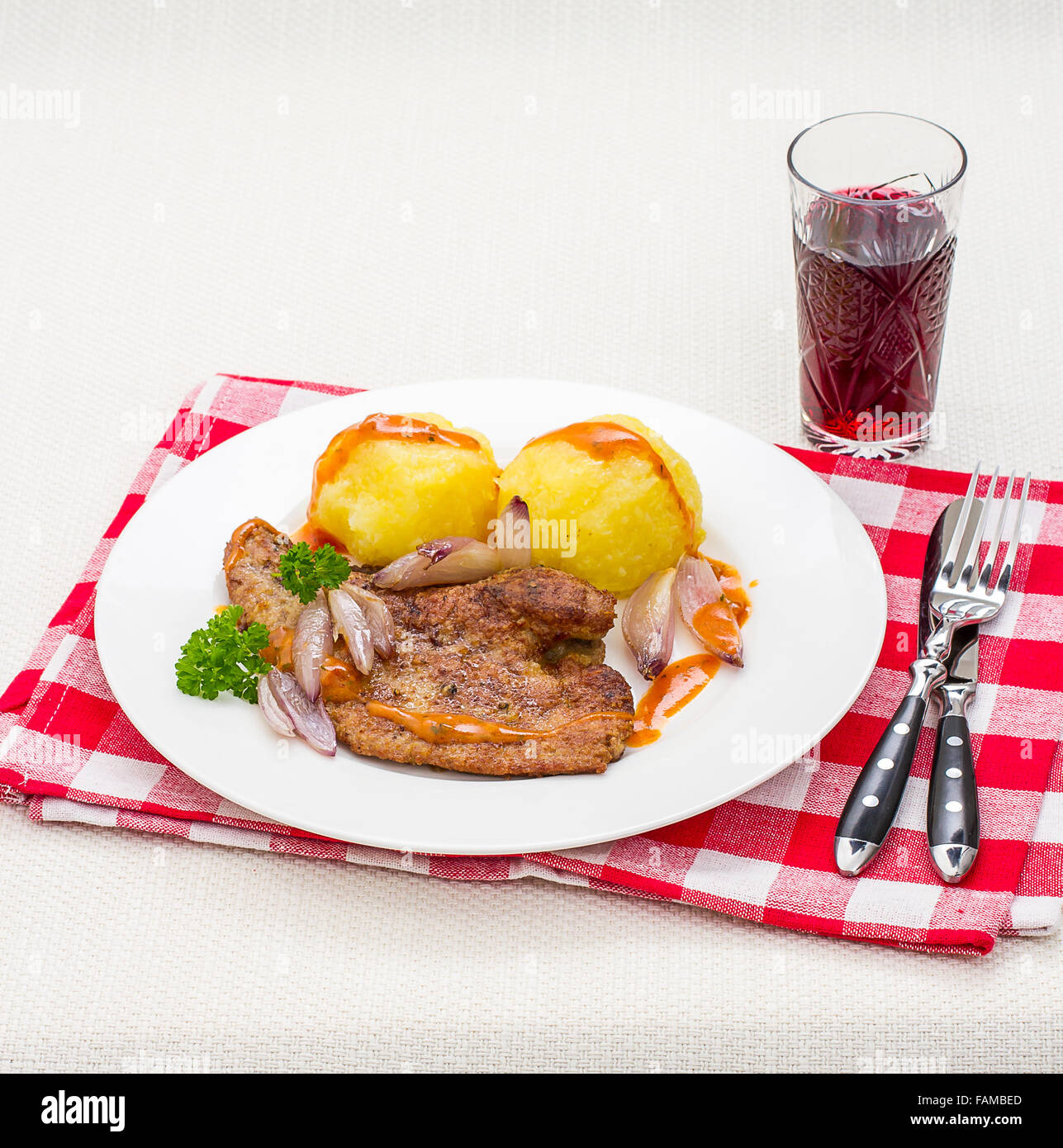 Roast veal liver with shallots and potato dumplings Stock Photo