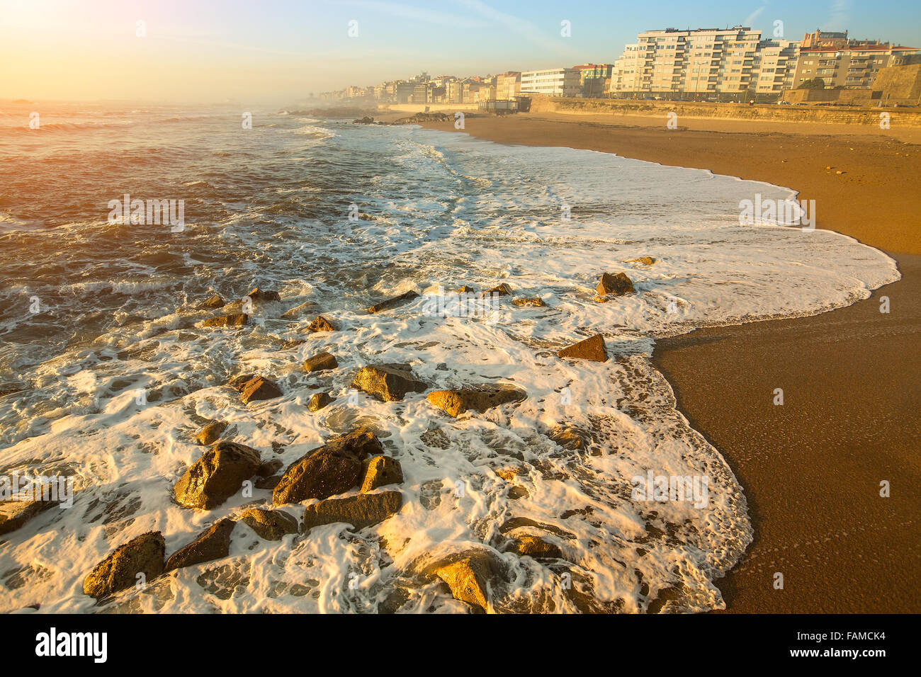 Peaceful ocean surf on the beach of Porto, Portugal. Stock Photo