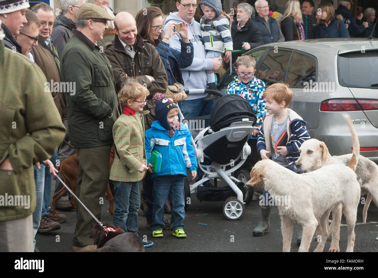 Uppingham, Rutland, UK., 1st January 2016. The Cottesmore Hunt held its annual New Year's Day meet in Uppingham Market Place where a large turnout of foot followers supported the meet. Credit:  Jim Harrison/Alamy Live News Stock Photo