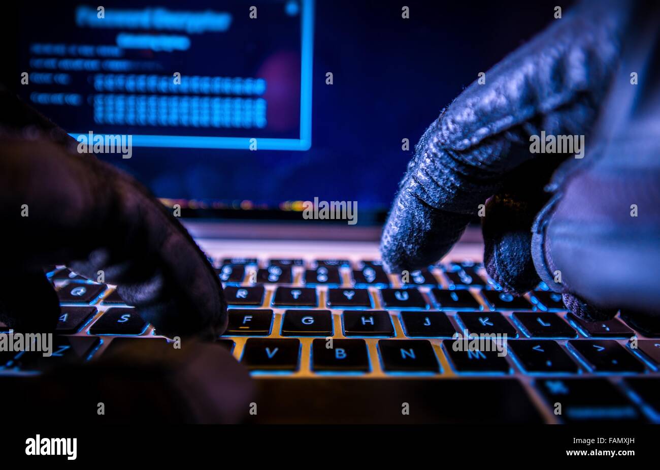 Payments System Hacking. Online Credit Cards Payment Security Concept. Hacker in Black Gloves Hacking the System. Stock Photo