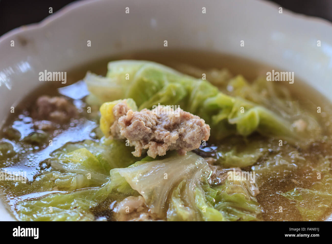 Clear vegetable soup with minced pork close up Stock Photo Alamy