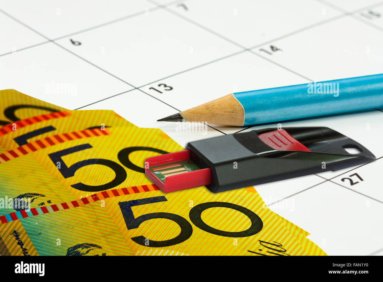 calander background with money pencil and USB Stock Photo