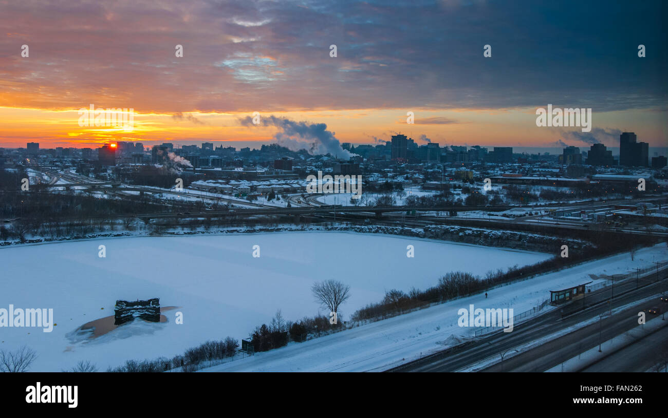 Early morning golden sun rises over Ottawa and Gatineau. Stock Photo