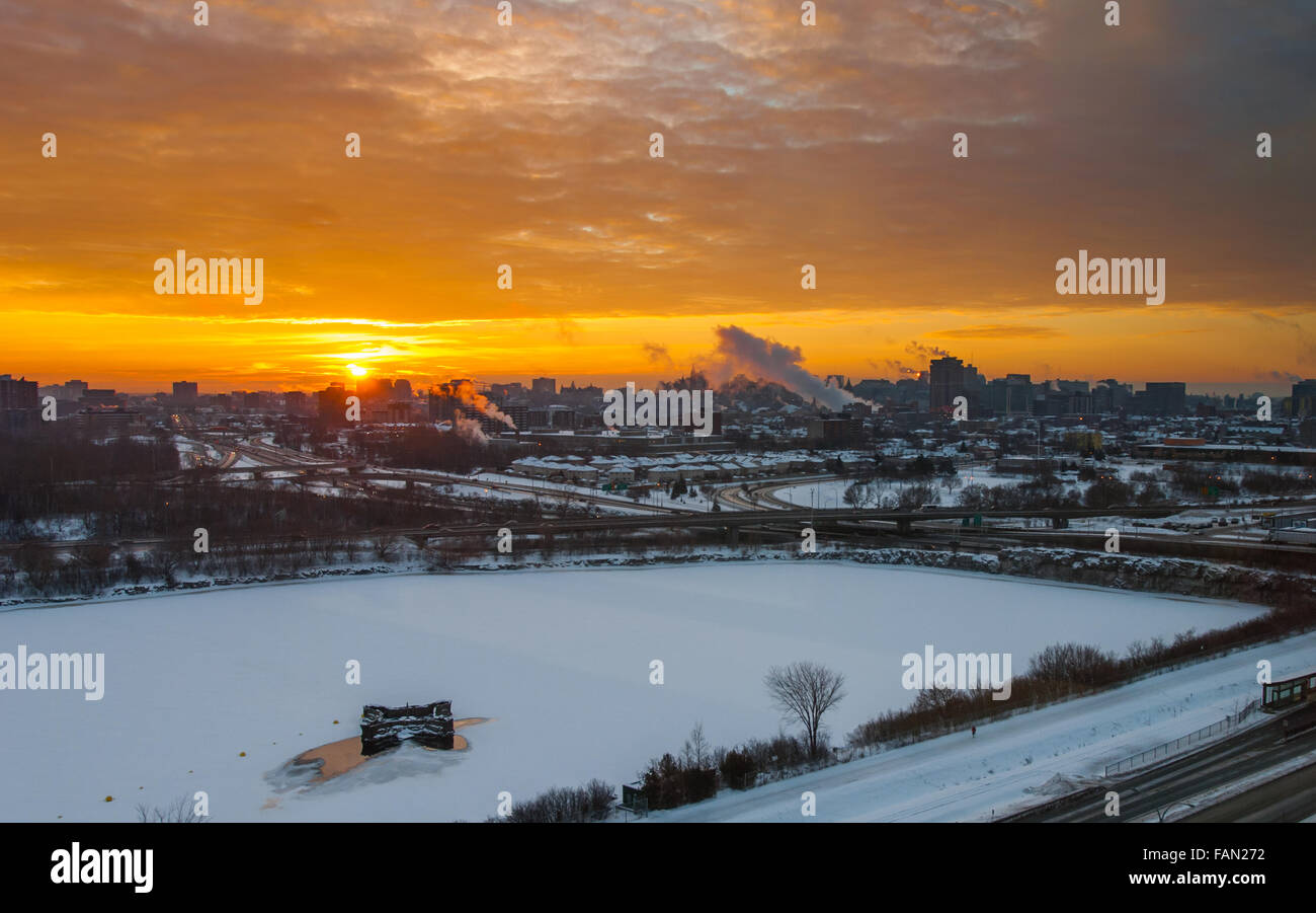 Early morning golden sun rises over Ottawa and Gatineau. Stock Photo