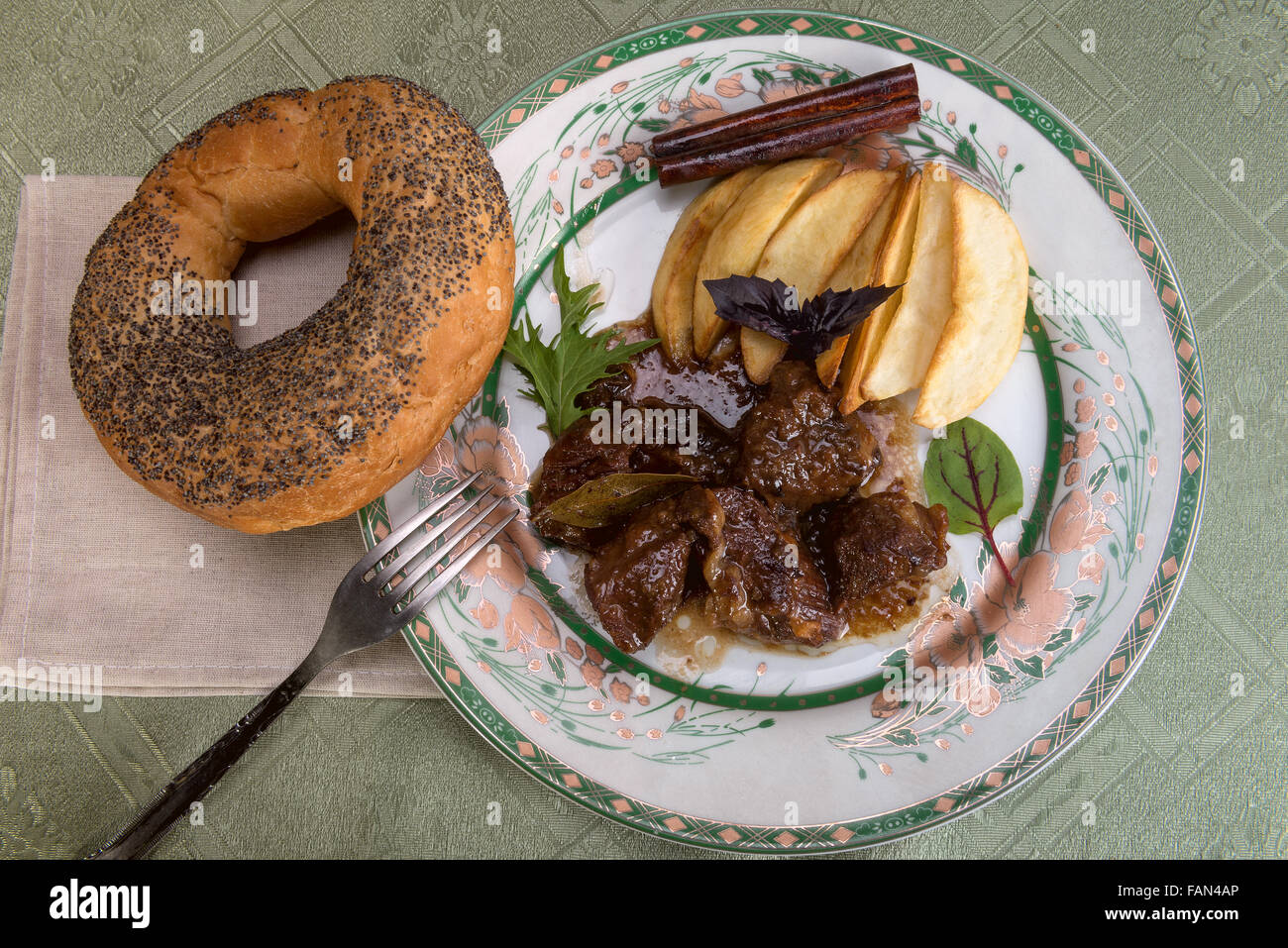 Esik fleisch - A traditional Ashkenazim Jewish dish made of beef, braised in sour-sweet sauce with damson plums and spices Stock Photo