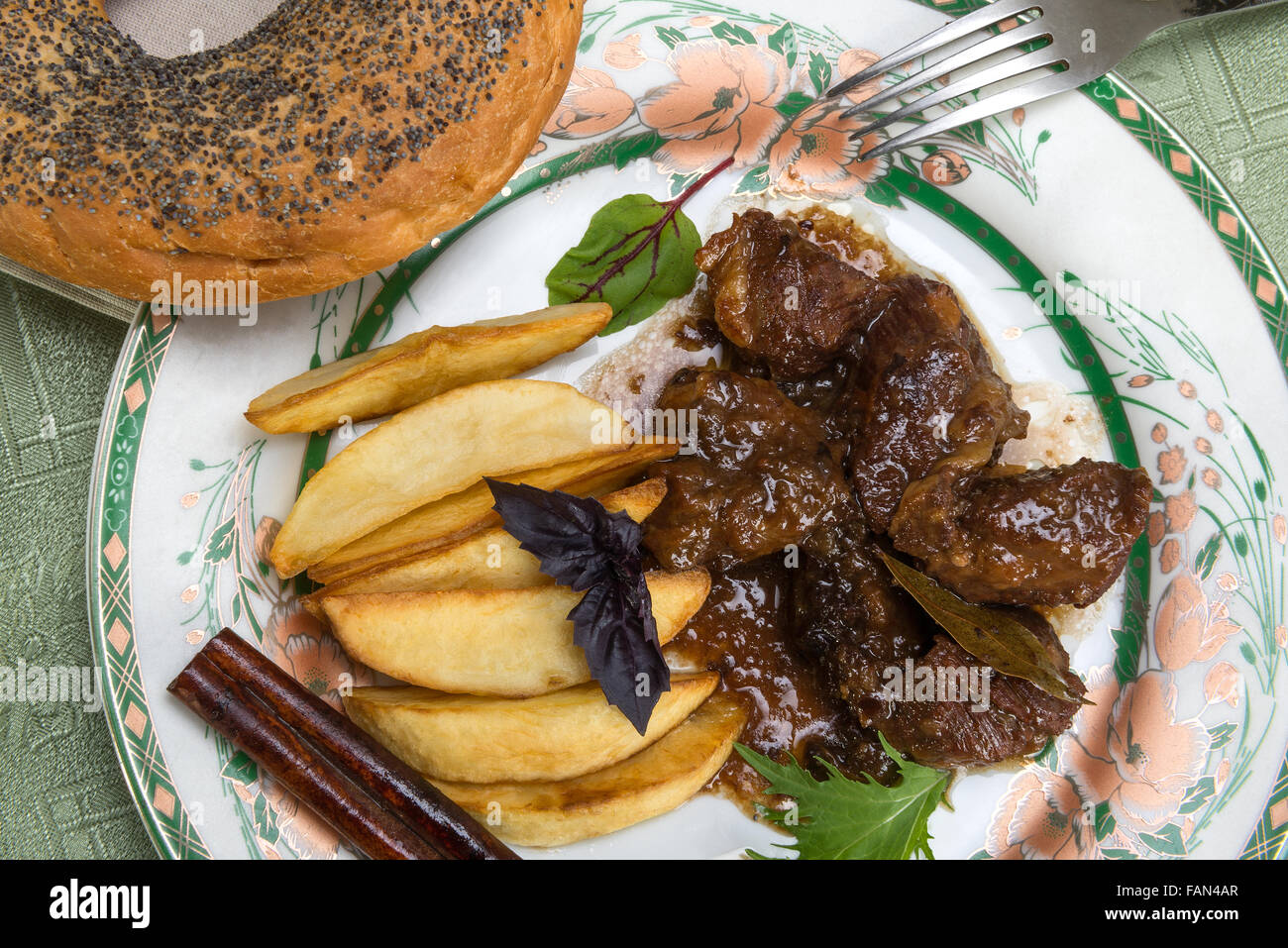 Esik fleisch - A traditional Ashkenazim Jewish dish made of beef, braised in sour-sweet sauce with damson plums and spices Stock Photo