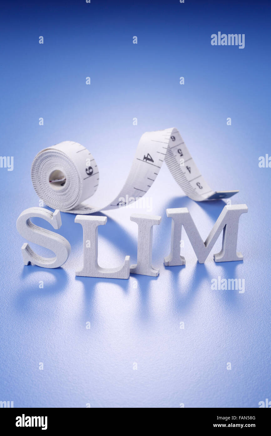 slim word and the measuring tape Stock Photo