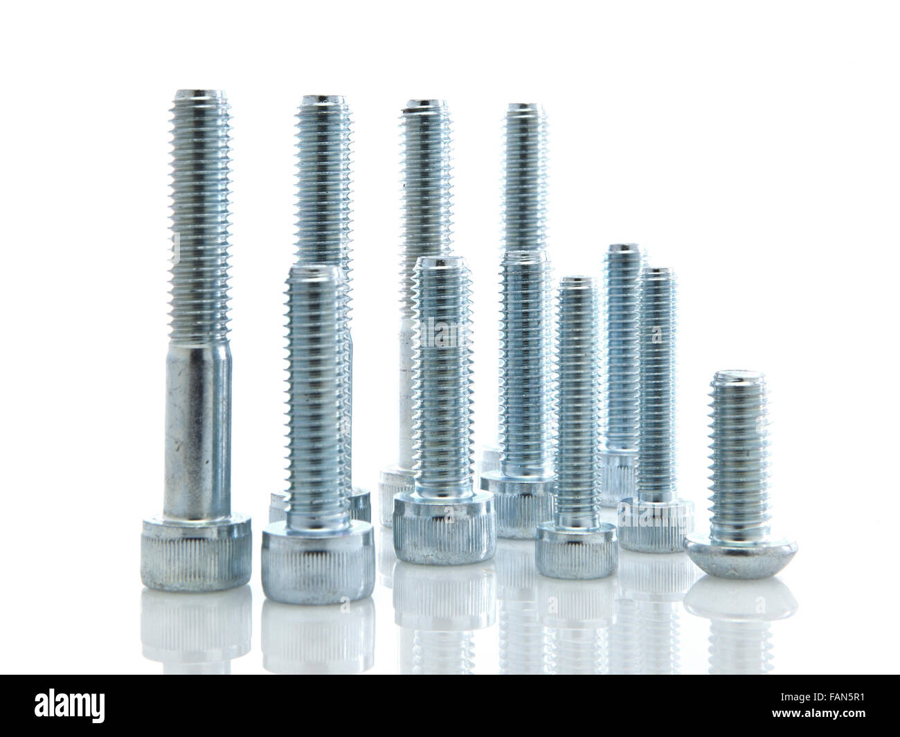 Assorted bolts on white background Stock Photo
