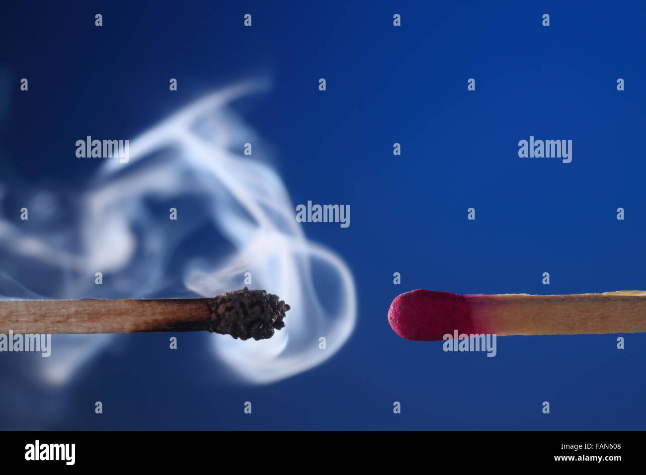 burnt match with smoke next to matchstick Stock Photo Alamy