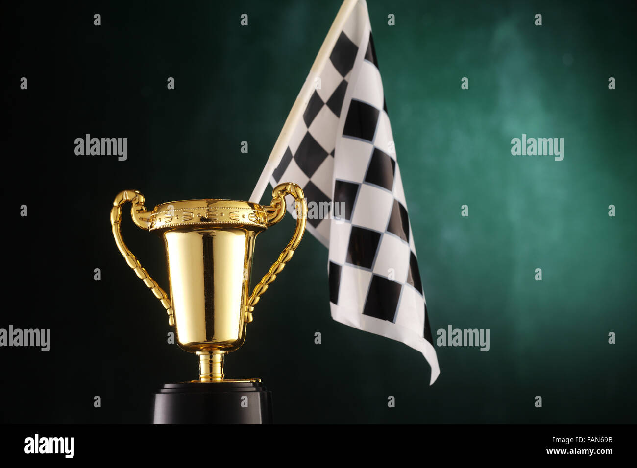 checker flag stands on trophy Stock Photo