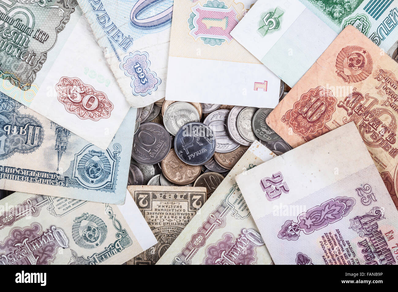 modern coin ruble surrounded by old banknotes of the USSR Stock Photo