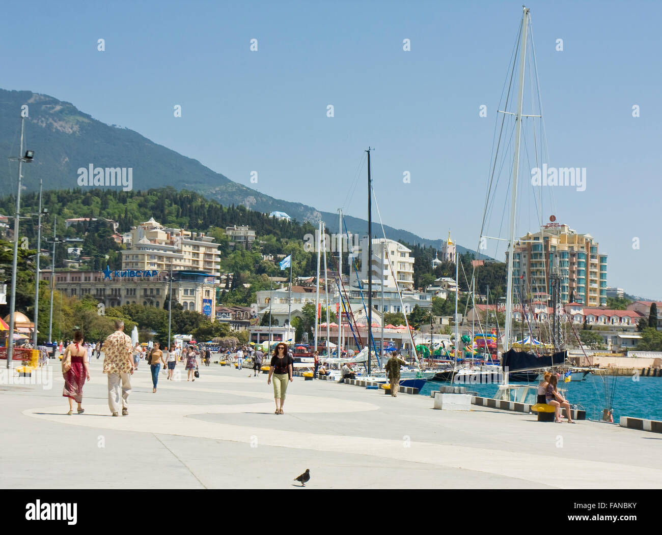 Yalta, Ukraine May 11, 2012 sea quay with hotels on shore and yachts