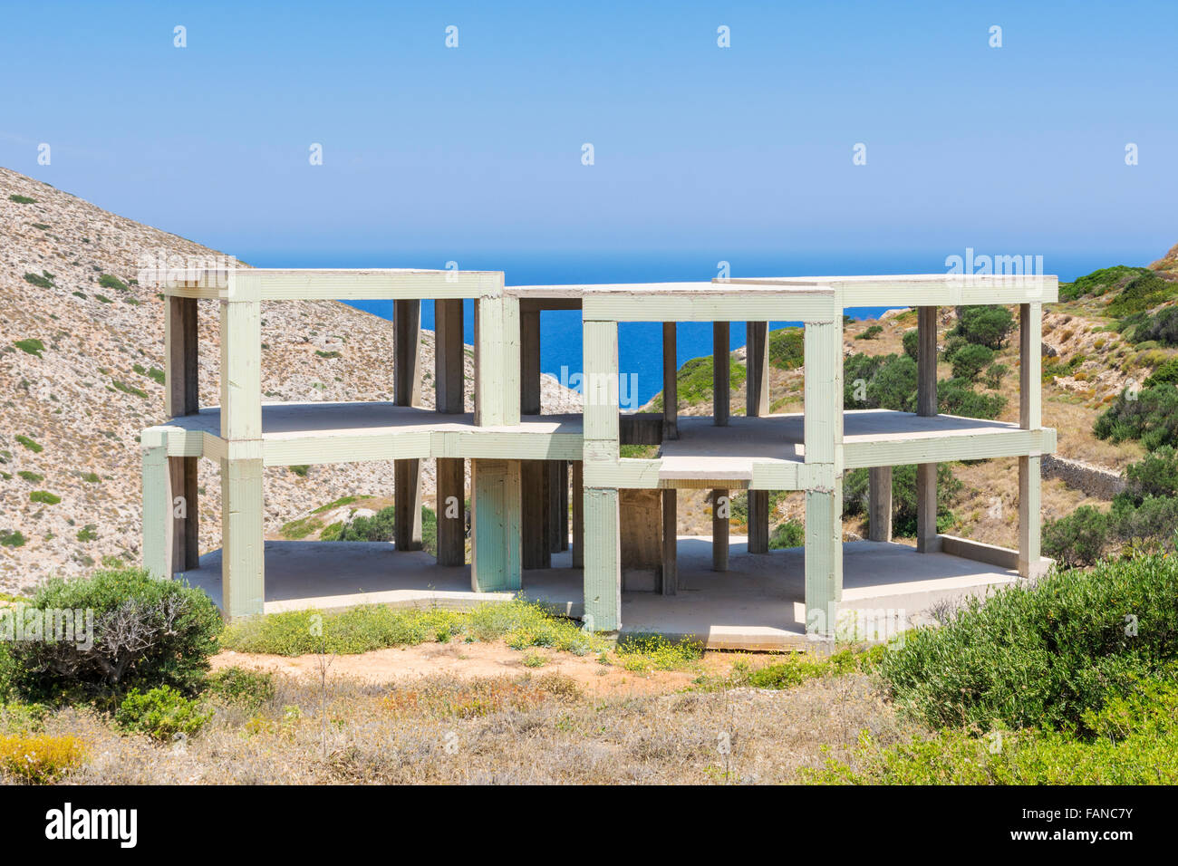 Unfinished house overlooking the sea in Greece Stock Photo