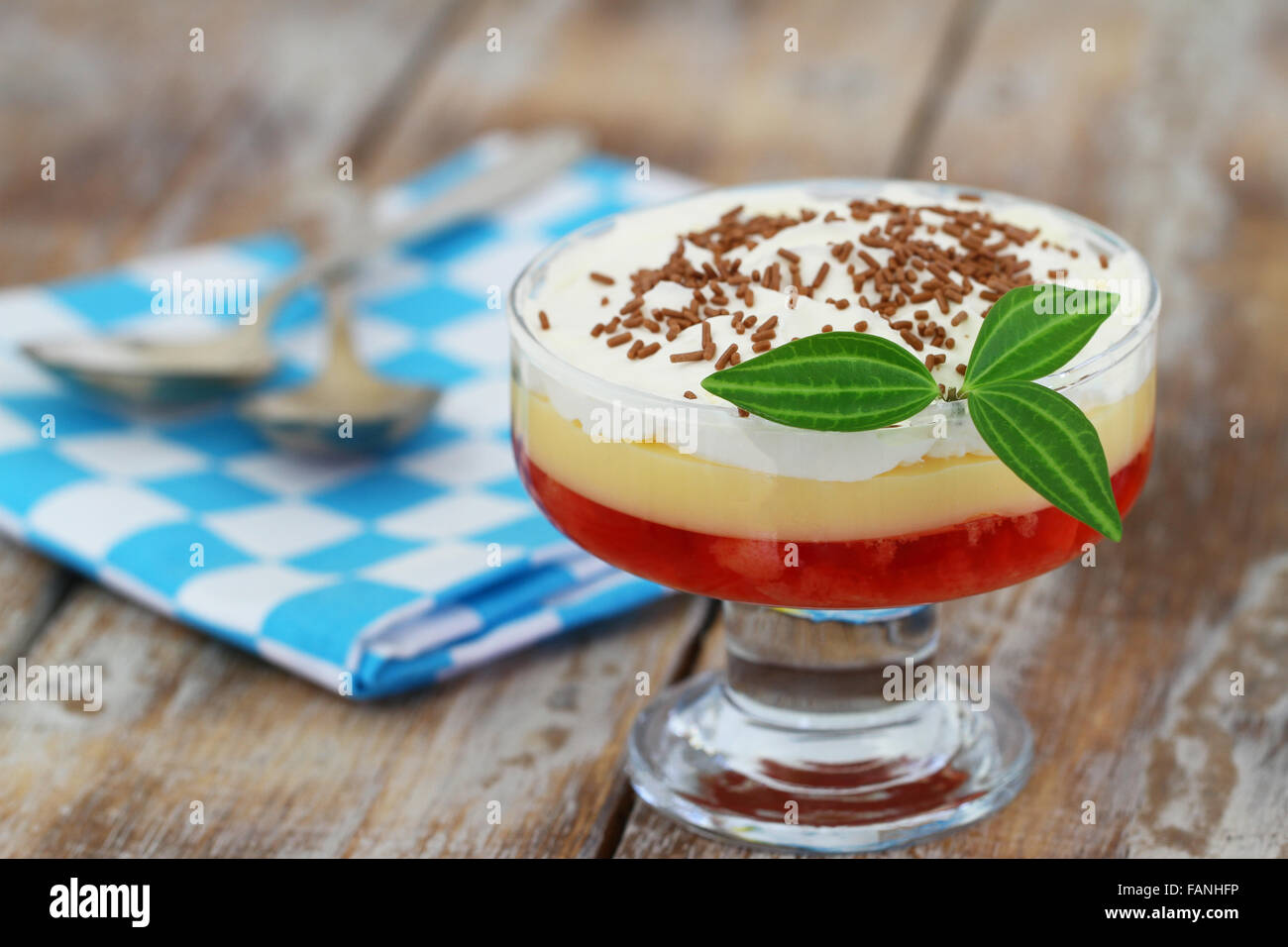 Traditional strawberry trifle dessert with fresh whipped cream and