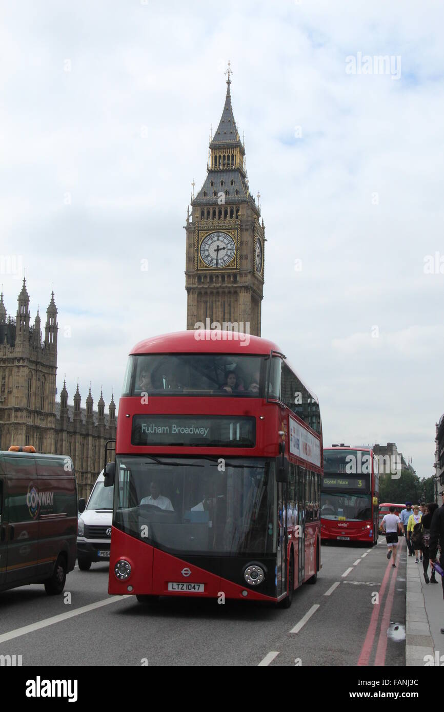 A RED NEW ROUTEMASTER BUS IN LONDON WITH BIG BEN VISIBLE BEHIND Stock ...