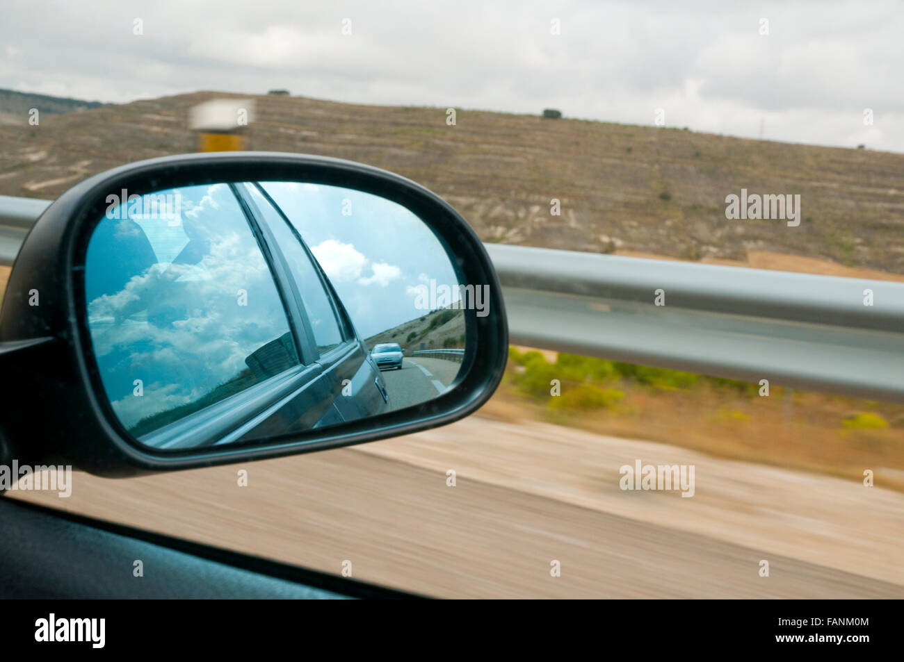 Road reflected on rear view mirror Stock Photo Alamy