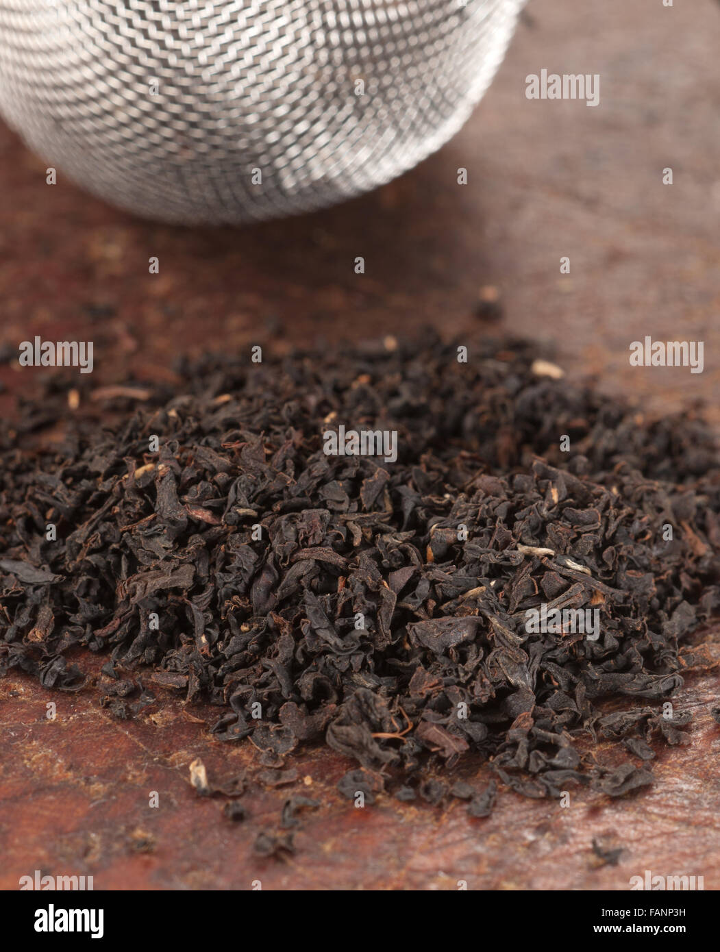 Black tea with on a board, close up shot Stock Photo