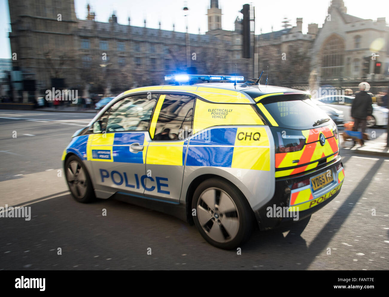 A Hybrid / Electric Bmw i3 police car speeding through London with lights flashing. Stock Photo