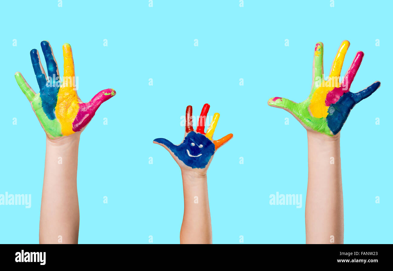 Cute smiling colorful painted hand on blue background Stock Photo - Alamy