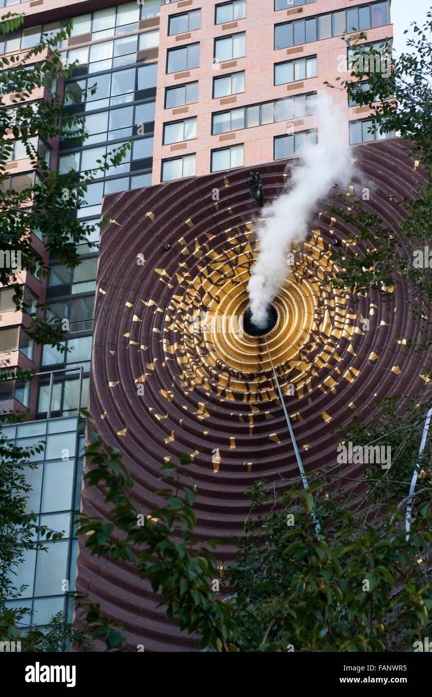 Metronome is a large public art installation located along the south end of Union Square in New York City. Hand and smoke, The Metronome, art wall at 1 Union Square South by Kristen Jones and Andrew Ginzel, Manhattan, New York City, US Stock Photo
