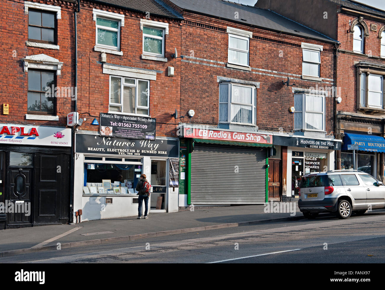 Healthfood shop and gun shop in Comberton Road, Kidderminster, UK Stock