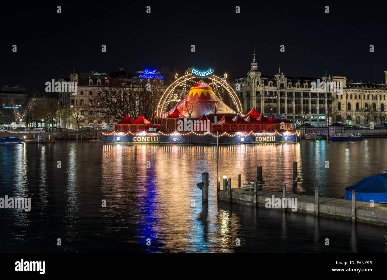Night scene, view from the Quai Bridge on the River Limmat with the Bauschänzli, Christmas circus Conelli, Zurich, Zurich Stock Photo