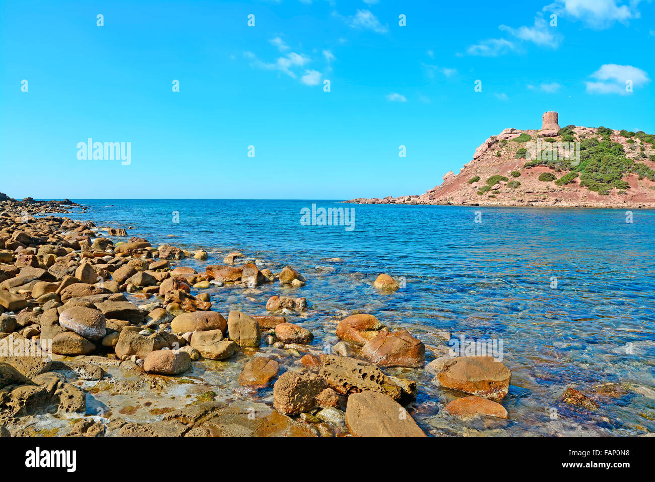 Porticciolo beach with its sighting tower, Sardinia Stock Photo - Alamy