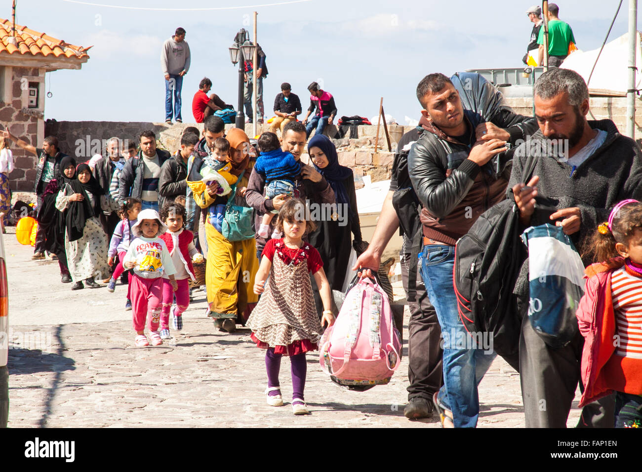Syrian refugees and immigrant  families having just arrived in  the town of Molyvos on the island of Lesbos Greece by inflatable boats Stock Photo