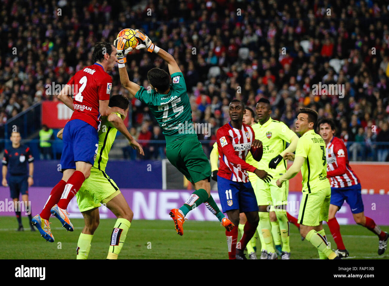 Madrid, Spain. 02nd Jan, 2016. Diego Marino (25) Levante UD and Diego Roberto Godin Leal (2) Atletico de Madrid during the La Liga match between Atletico de Madrid and Levante UD at the Vicente Calderon stadium in Madrid, Spain, January 2, 2016. Atletico won the game by a score of 1-0. Credit:  Action Plus Sports/Alamy Live News Stock Photo