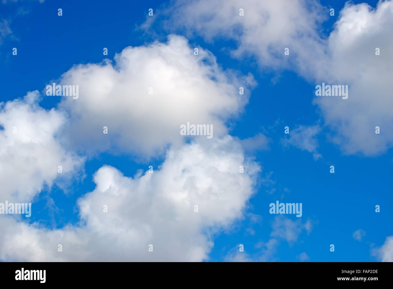 sunny blue sky and soft white clouds Stock Photo - Alamy