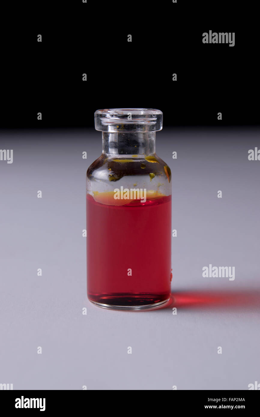 red medicine in vial Stock Photo - Alamy