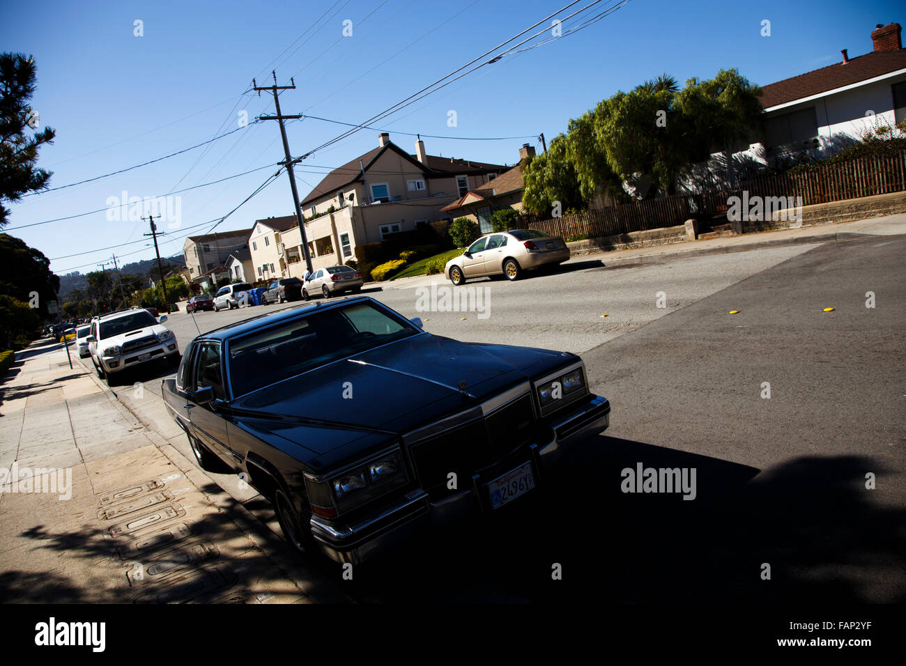 A Cadillac on a residential street in Monterey, California Stock Photo