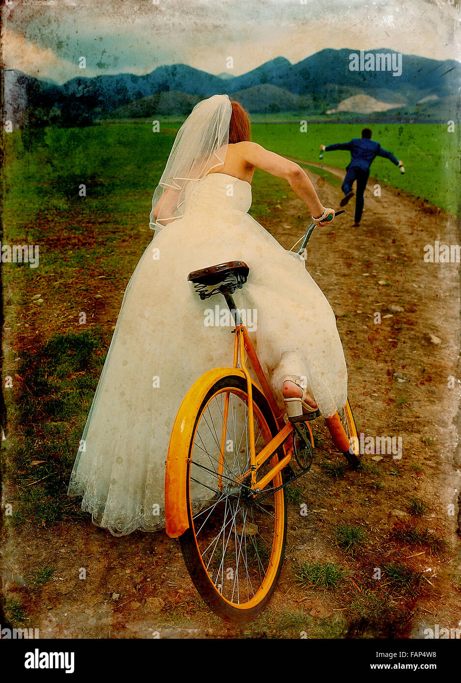 bride on orange retro bike is chasing after a groom in blue wedding